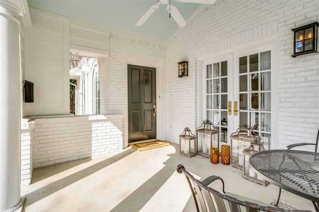 Flickering lanterns set the tone before you step inside. 