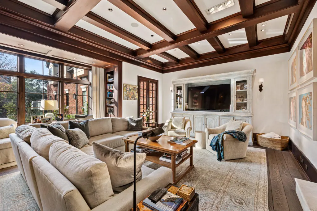 Rich mahogany beam work lends an old world feel in the family room of the Frances and Tony Buzbee home at 1722 River Oaks Boulevard.  (Photo by Courtesy of Josh Gremillion for Douglas Elliman)   