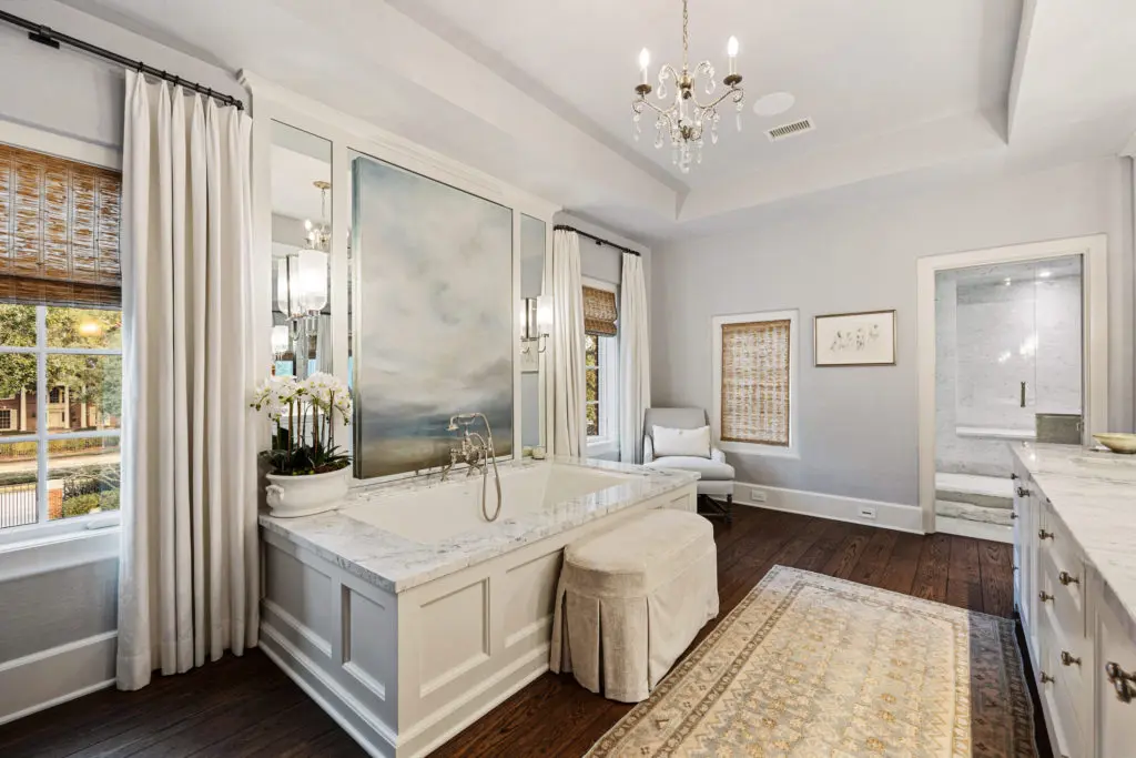 Her bath in the owner's suite in the 1722 River Oaks Boulevard home of Frances and Tony Buzbee. (Photo by Courtesy of Josh Gremillion for Douglas Elliman)