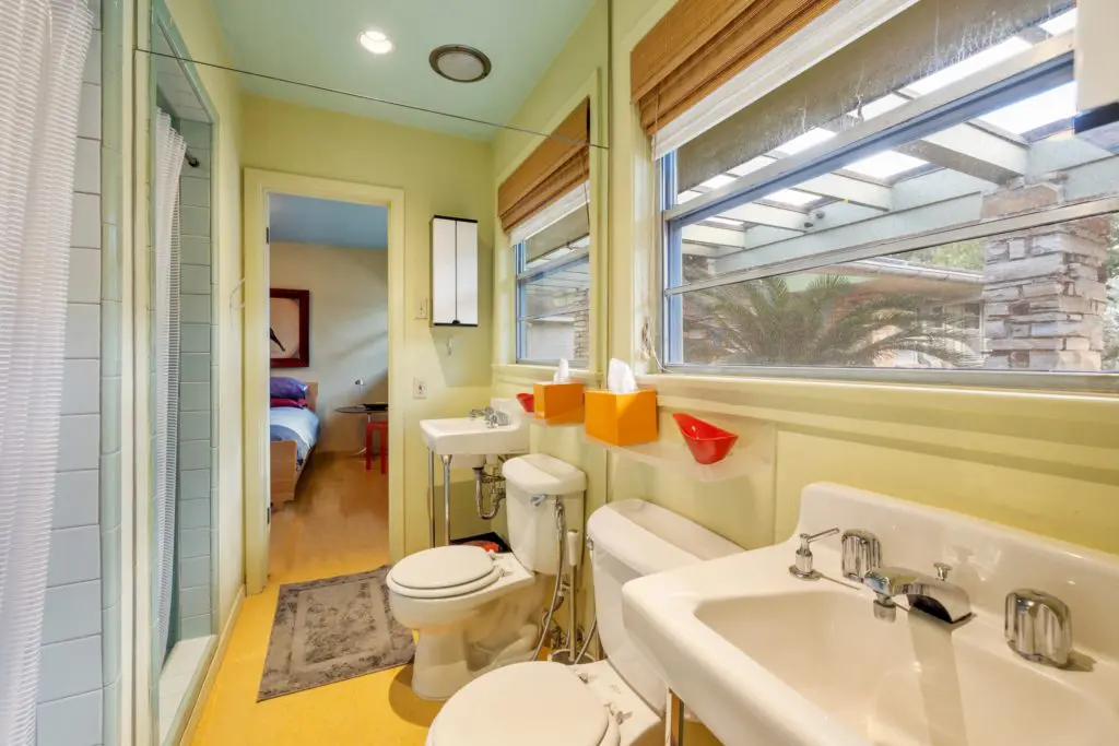 Mirror play in the mid-century modern time-capsule dwelling at 2430 Maroneal Street in Old Braeswood   (Photo by Josh Gremillion Photography)