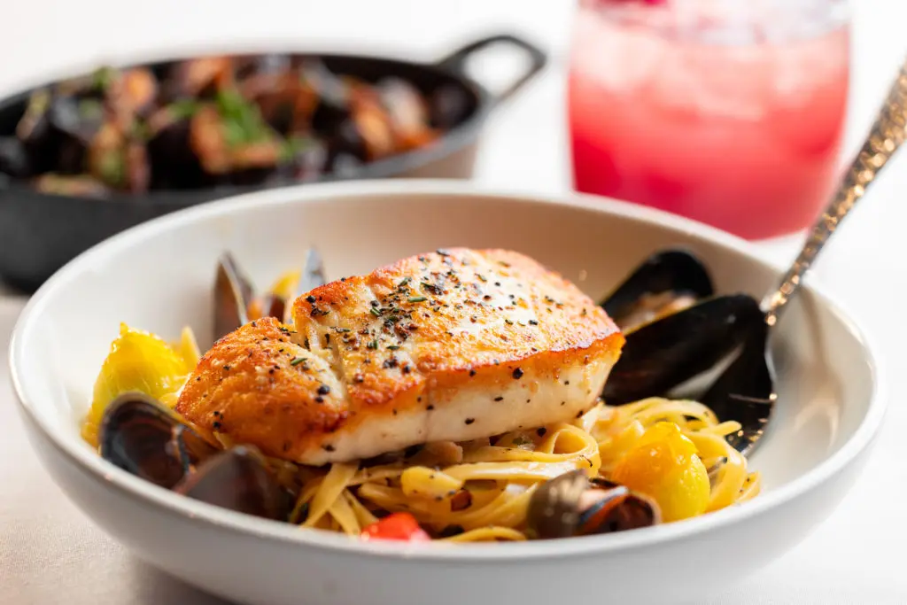A popular item at Wits is the Alaskan Halibut with fettuccine. (Photo by Kathy Tran)