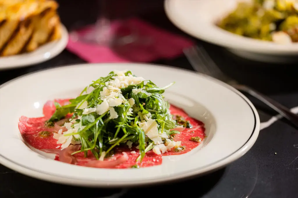 Sfuzzi menu items include starts like beef carpaccio. (Photo by Kathy Tran)