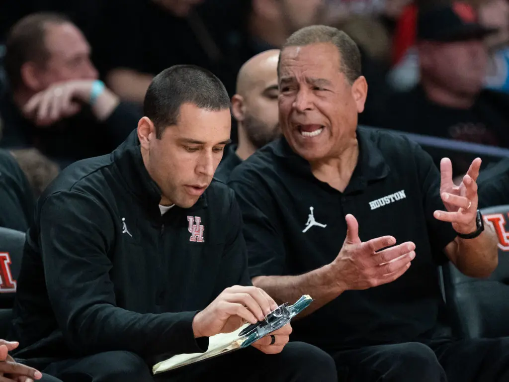 University of Houston coaches Kellen Sampson and his dad Kelvin Sampson know how to coach effort. (Photo by F. Carter Smith)