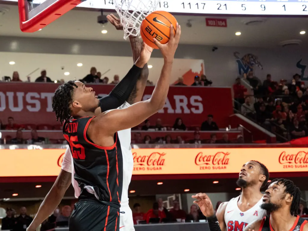 University of Houston center Josh Carlton has become adept at all kinds of ways to score inside. (Photo by F. Carter Smith)