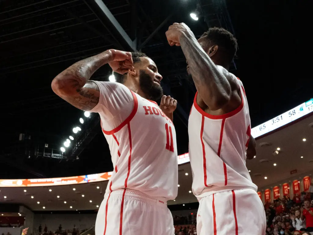 Kyler Edwards and Taze Moore know you have to be strong to play for the University of Houston. (Photo by F. Carter Smith)