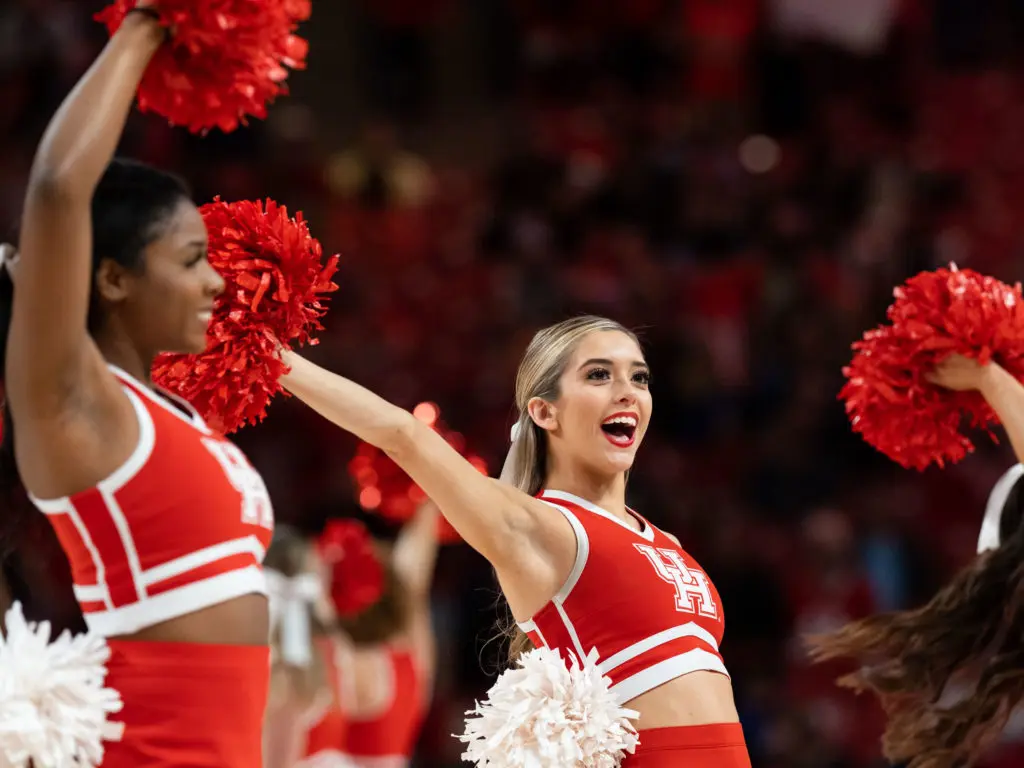 The University of Houston cheerleaders bring plenty of enthusiasm to the Fertitta Center.