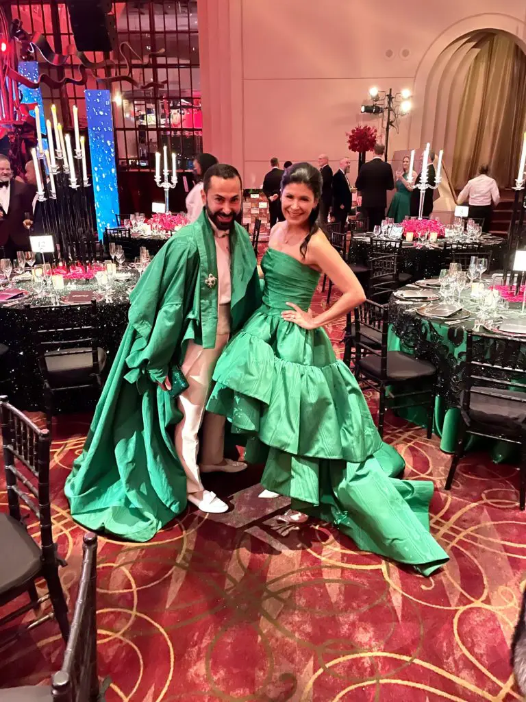 Fady Armanious, Kristy Bradshaw posing together in their matching Oscar de la Renta fashions. (Courtesy photo)
