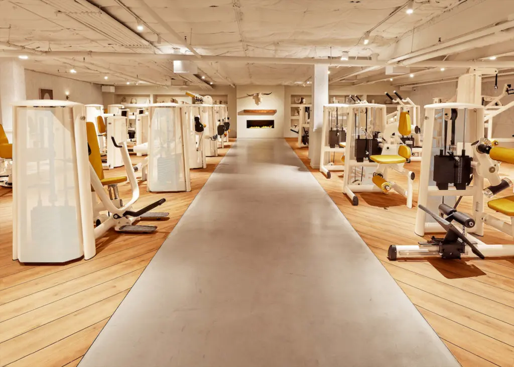 In the Texas room (and beyond), German equipment is custom-designed to fit the aesthetic of the space.  (Photo by JOHN REED Fitness)