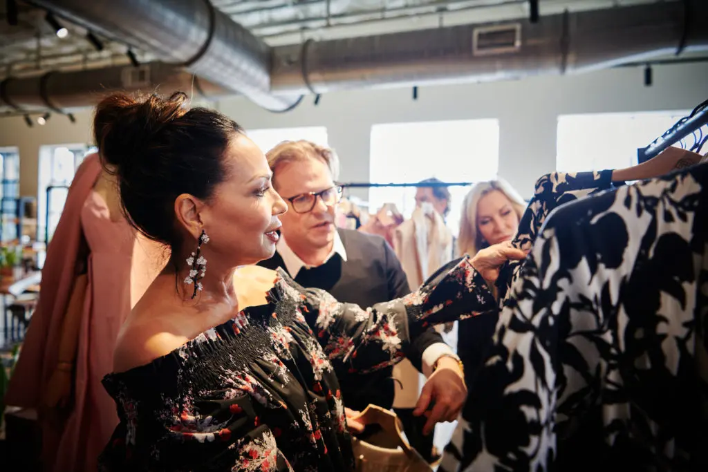 Moll Anderson perusing the collection with designer Adam Lippes (Photo by Jonathan Zizzo)