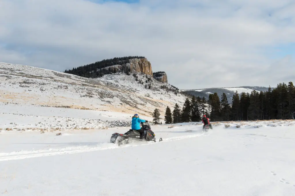 Snowmobiling excursions are one of the many activities offered at Eatons Ranch in Sheridan during the winter months. (Courtesy Visit Wyoming)