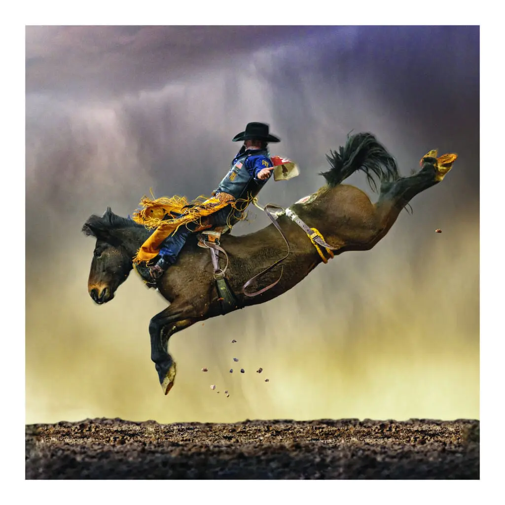 Steve Wrubel's "New Mexico Rain" photograph illustrates the beauty of riding against a dramatic landscape.