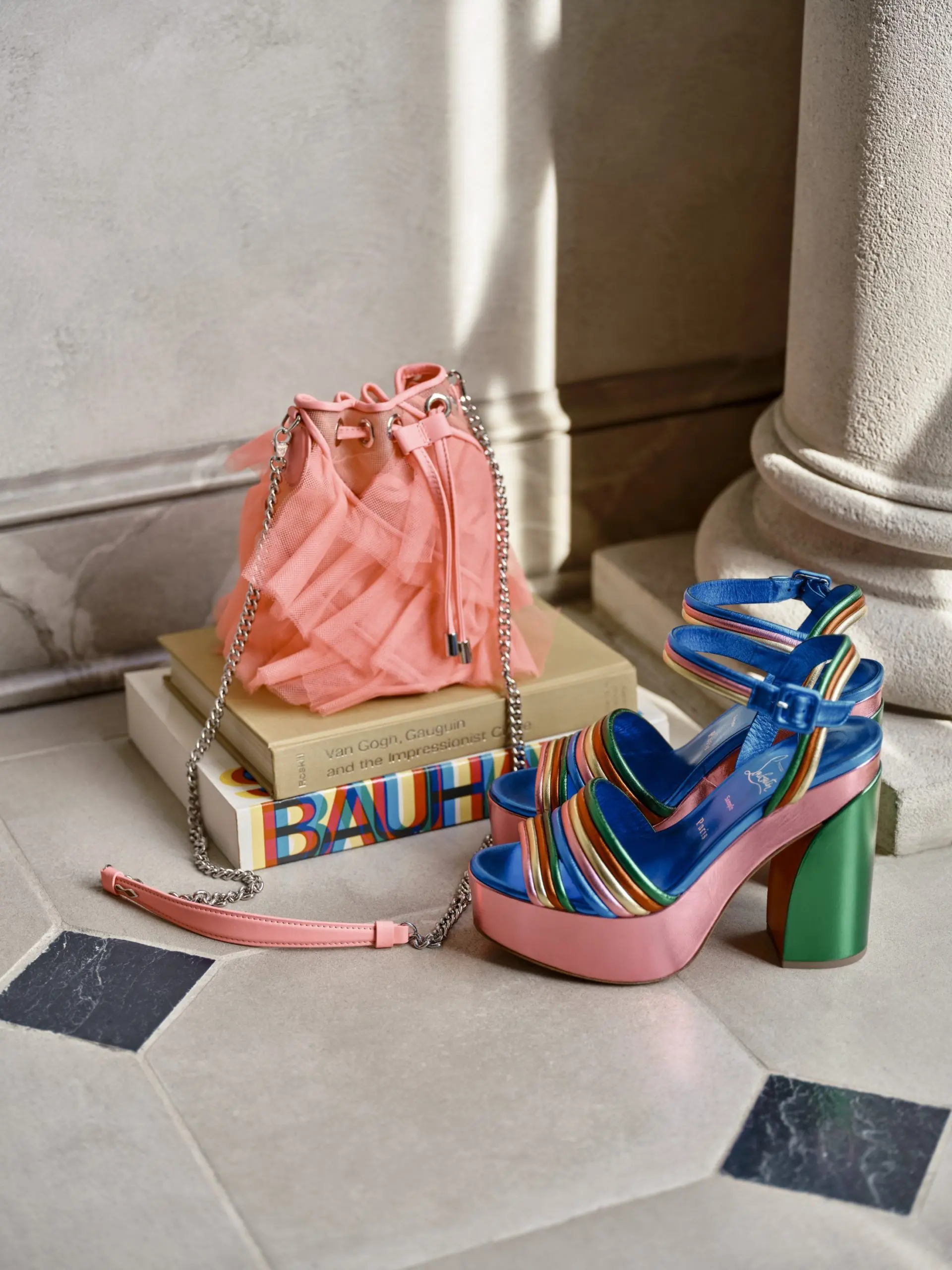 Accent your spring wardrobe with accessories and shoes from Christian Louboutin.