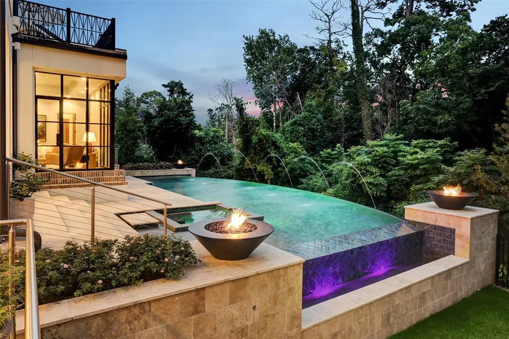 The ravine lot at 59 Tiel Way in River Oaks lends  itself to dramatic hardscaping.