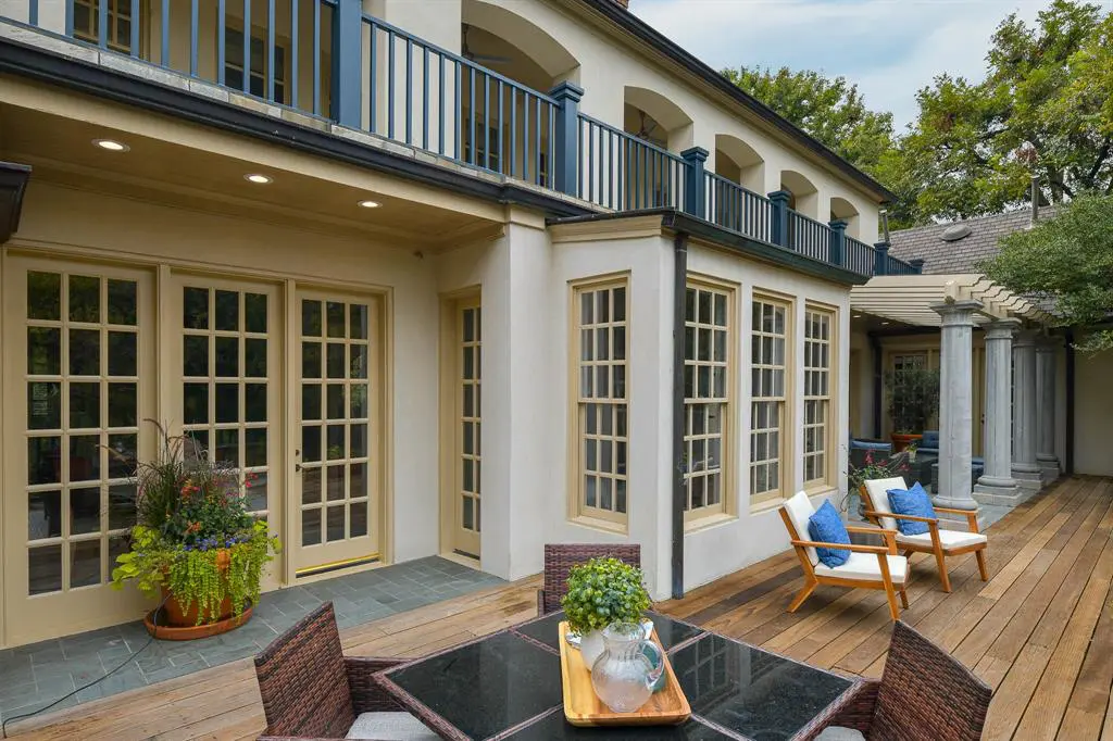 Window-lined terraces command the first and second floor. 