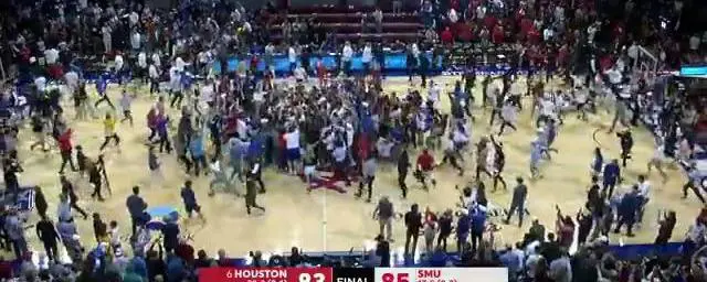 SMU fans stormed the court after the 85-83 toppling of No. 6 Houston.