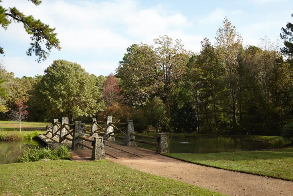 The bridges and porches were made from felled cedar trees from the property. (Photo by Tria Giovan)