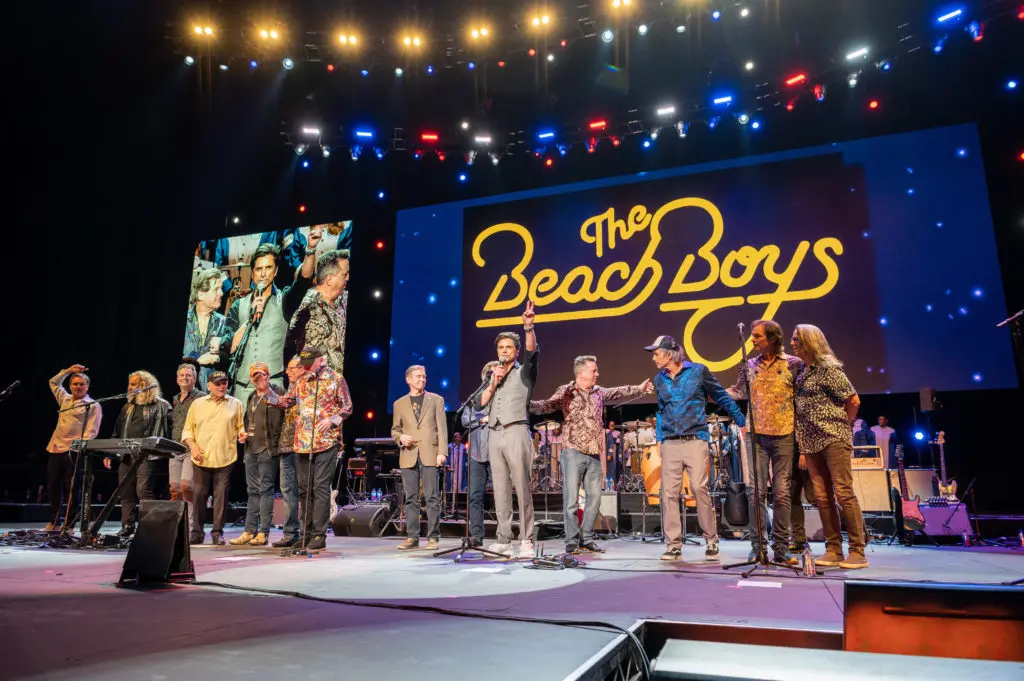MD Anderson Cancer Center 80th anniversary emcee John Stamos on stage at Toyota Center with the Beach Boys. (Photo courtesy of MD Anderson)