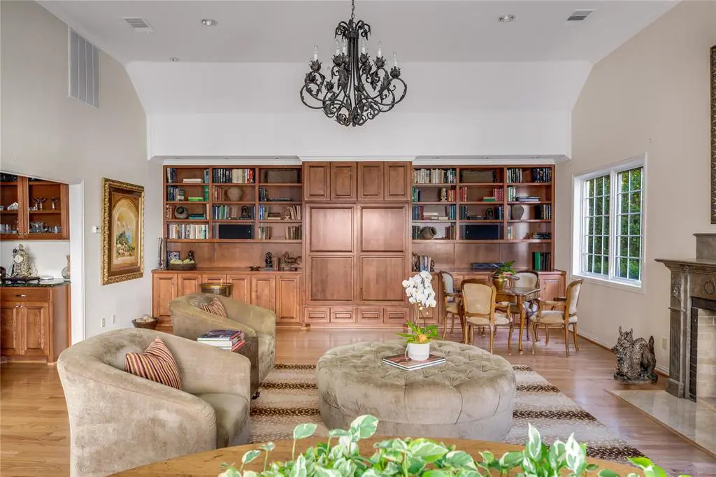 Handsome built-ins match the home's gleaming hardwood floors. 