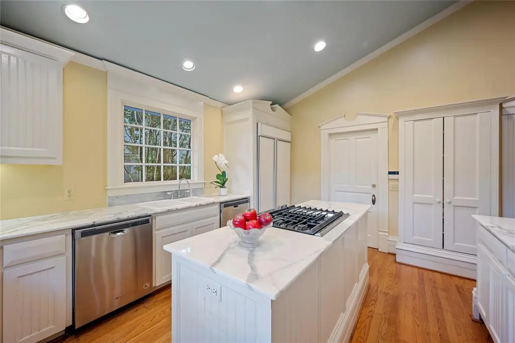 Naturally, modern updates have been made as well. The renovated chef’s kitchen features sparkling Carrara marble. 