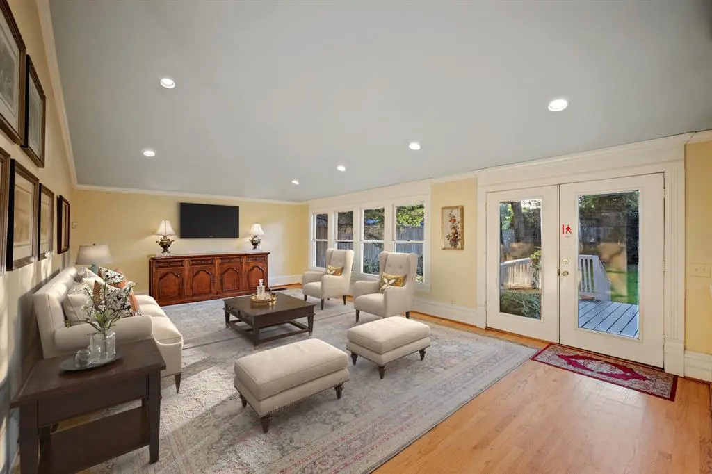Aa sunny family room, which could also be converted into a dining room just off the chef's kitchen.  