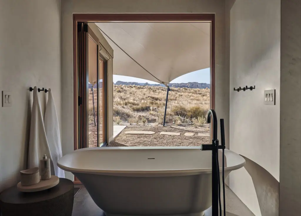 After a challenging day reaping the benefits of nature, soak in an open air tub with a mesa view. (Photo courtesy of Amangiri)