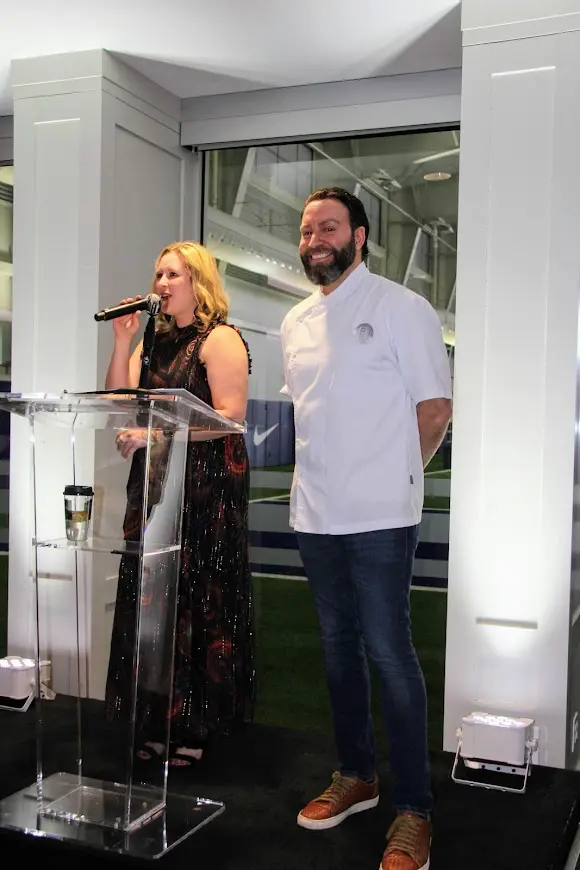 Auctioneer Morgan Hopson with private chef Rami Rassas. 