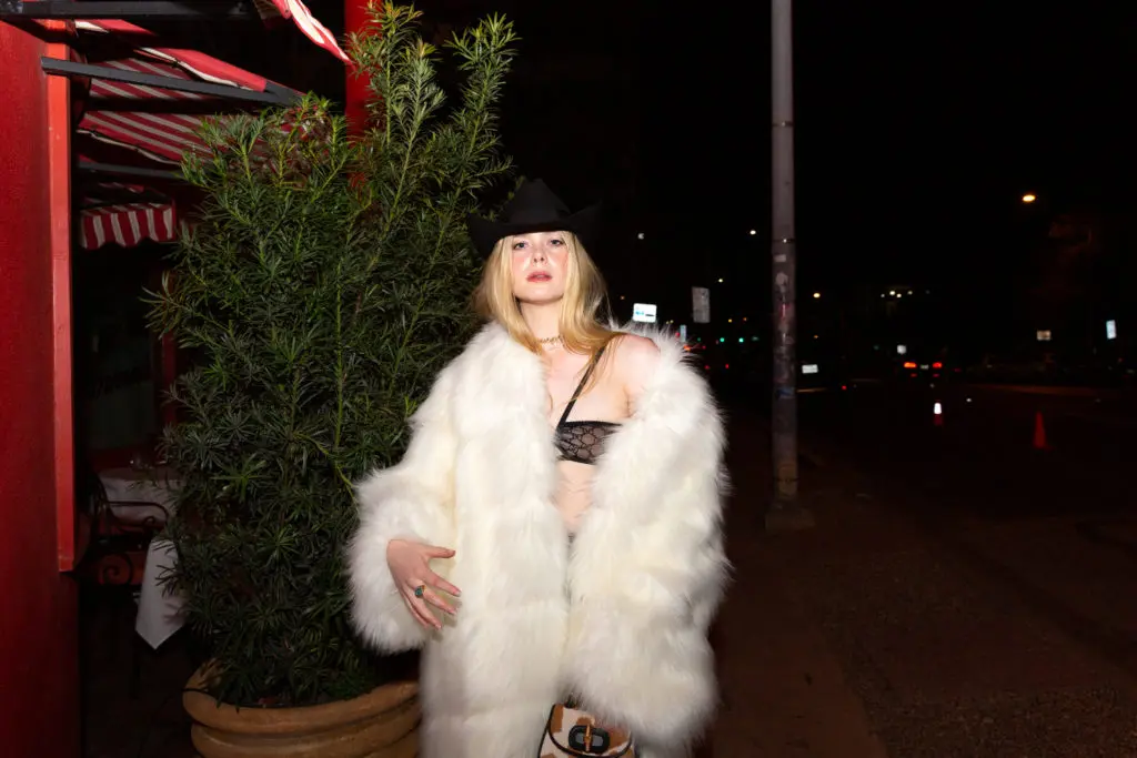 Actress Elle Fanning poses outside of Austin hotspot Sammy's Italian for the Gucci  x Bumble gathering during SXSW.(Courtesy of BFA for Gucci)