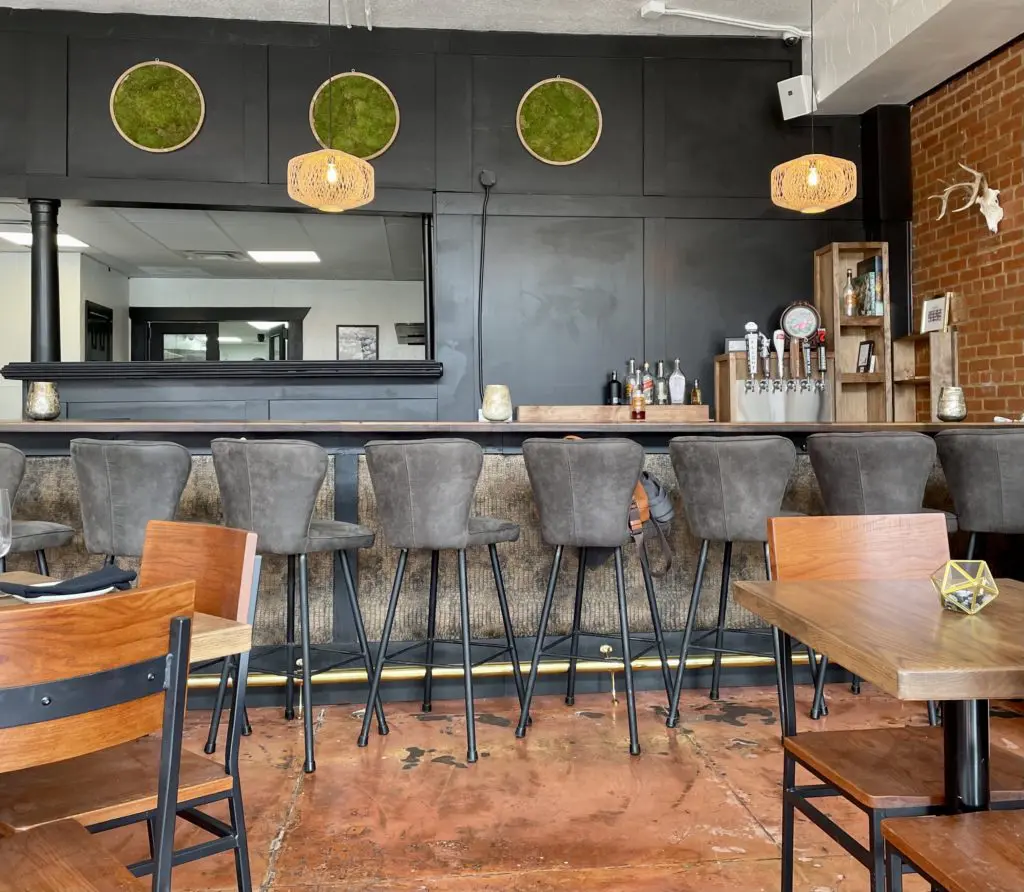 The long back bar area at The Beast and Company, will serve classy cocktails and fine selection of wines. (Photo by Courtney Dabney)