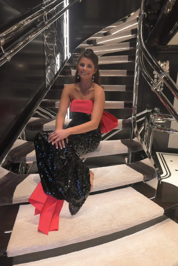 Blayne Fertitta at the 2022 San Luis Salute to Galveston Mardi Gras, pictured here on 'Boardwalk,' her father Tilman Fertitta's 77-meter superyacht. (Photo by Rhea Hemming)