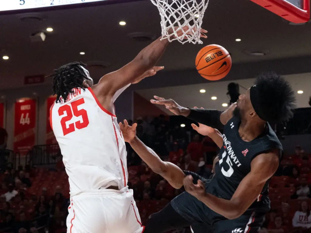 University of Houston center Josh Carlton can be an intimidating presence inside. (Photo by F. Carter Smith)