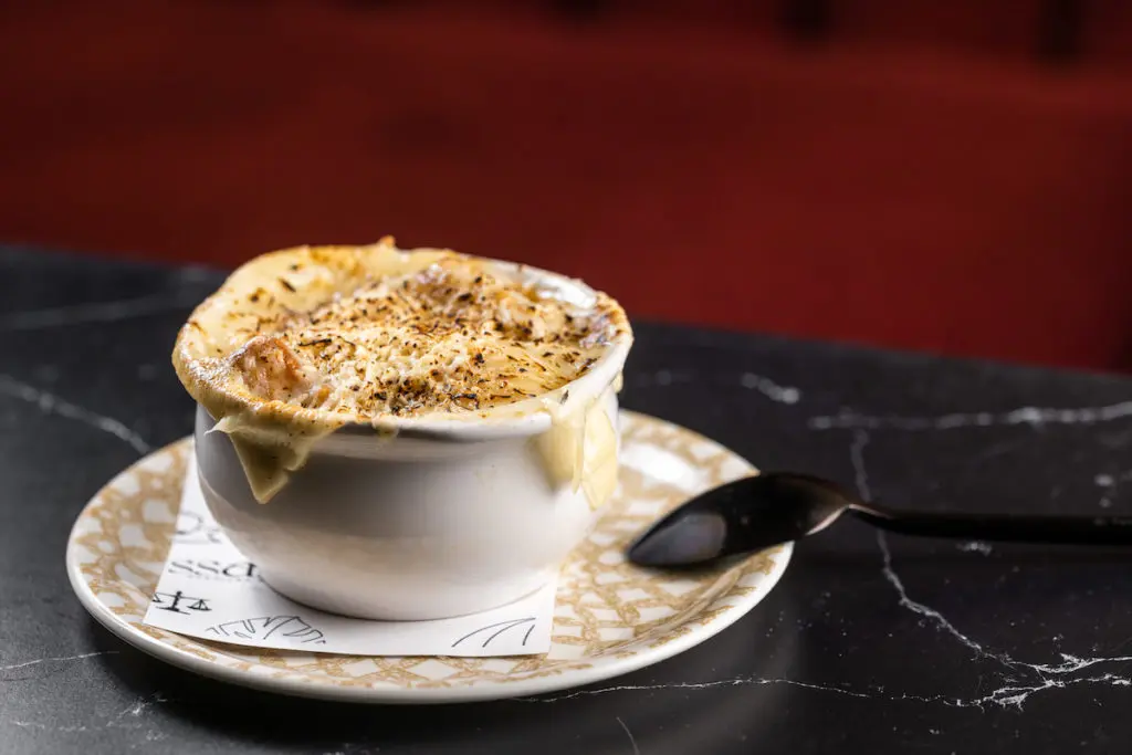 Don't miss the French Onion Soup at Toussaint Brasserie. (Photo by Kathy Tran)