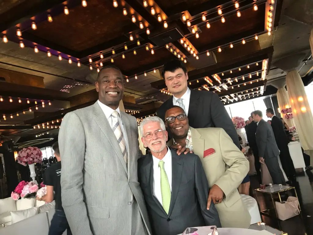 Dikembo Mutombo, Dr. Jim Muntz, Yao Ming, Rockets trainer Keith Jones