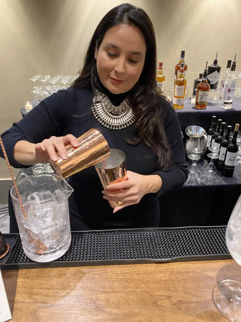 Heralded bar tender Alba Huerta mixing her special concoctions at the Truffle Masters competition. (Photo by Shelby Hodge)
