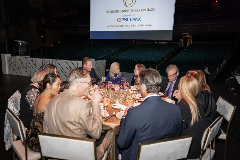 Ken Novice hosts table guests (Photo by Thomas Garza Photography)