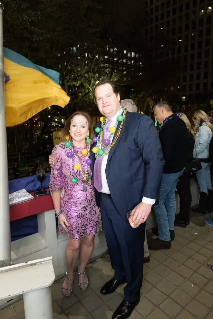 Mignon & Steve Gill on the balcony at Blake Hotel for the Krewe of Hermes parade watch party (Photo by Daniel Ortiz)