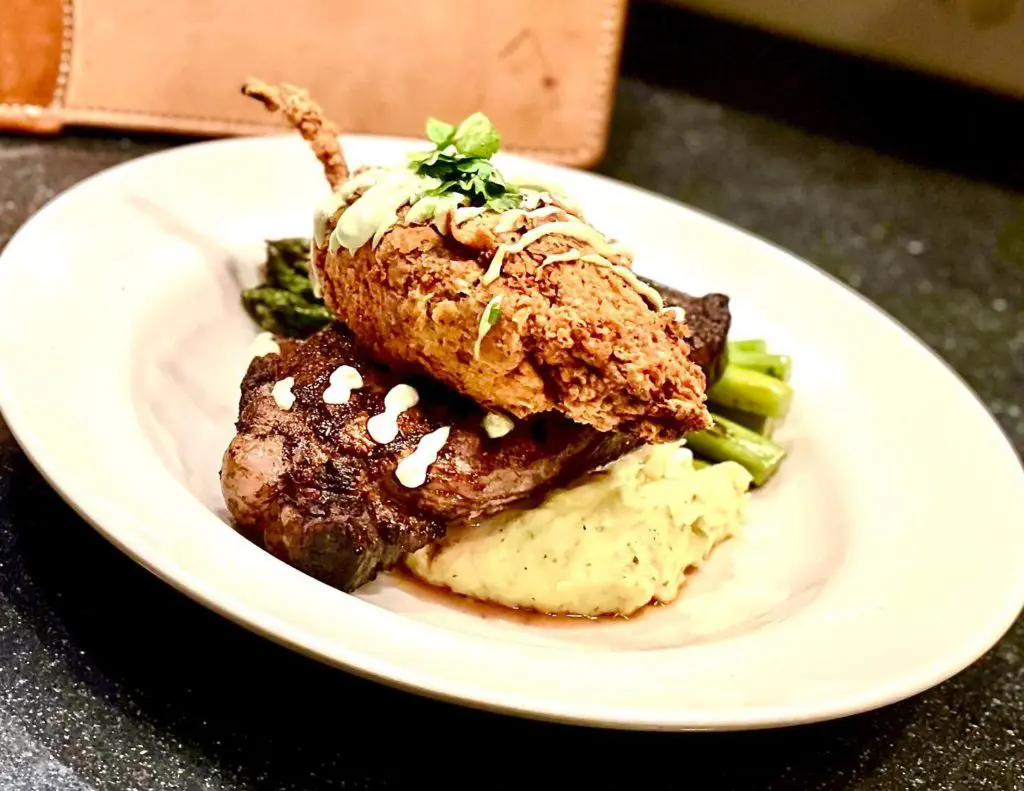 Poblano pepper tops a ribeye steak and mashed potatoes. It's just one of the cowboy cuisine dishes on the menu at Fort Worth's Reata.
