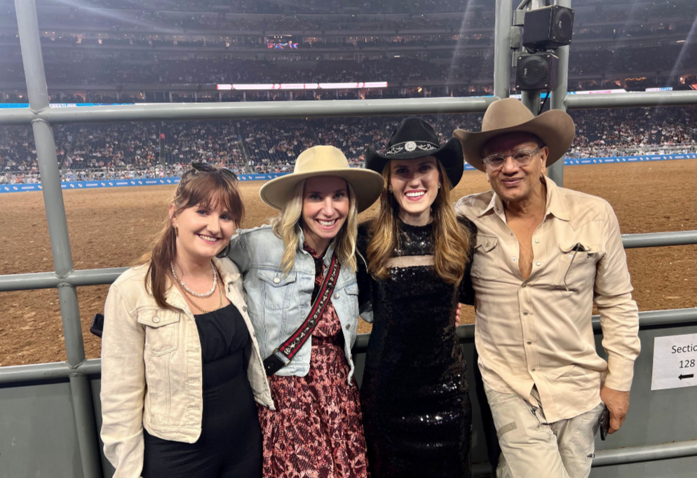 Naeem Khan, right, and his team members Ilena Brady and Kristen Seredynski join Neiman Marcus  brand experience manager Heather Almond, second from right, at the Houston Livestock Show and Rodeo. (Courtesy photo)