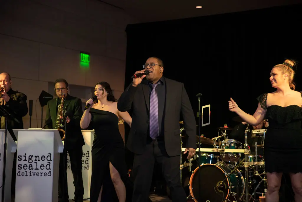 Signed Sealed Delivered performed for the party-ready guests. (Photo by Tamytha Cameron   )
