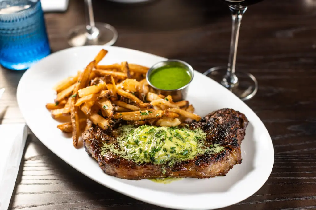 The steak frites are a must-try at Toussaint Brasserie. (Photo by Kathy Tran)