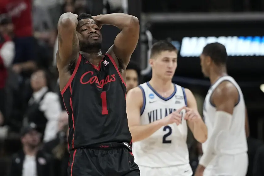 UH point guard Jamal Shead cannot contain his emotions after the Cougars' loss to Villanova in the Elite Eight.