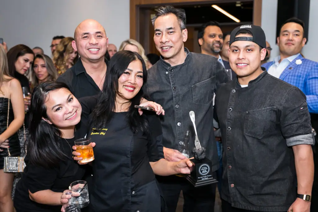 The Hidden Omakase team and chef Niki Vongthong celebrating the Truffle Masters third place win. (Photo by Emily Jaschke, zenfolio.com)