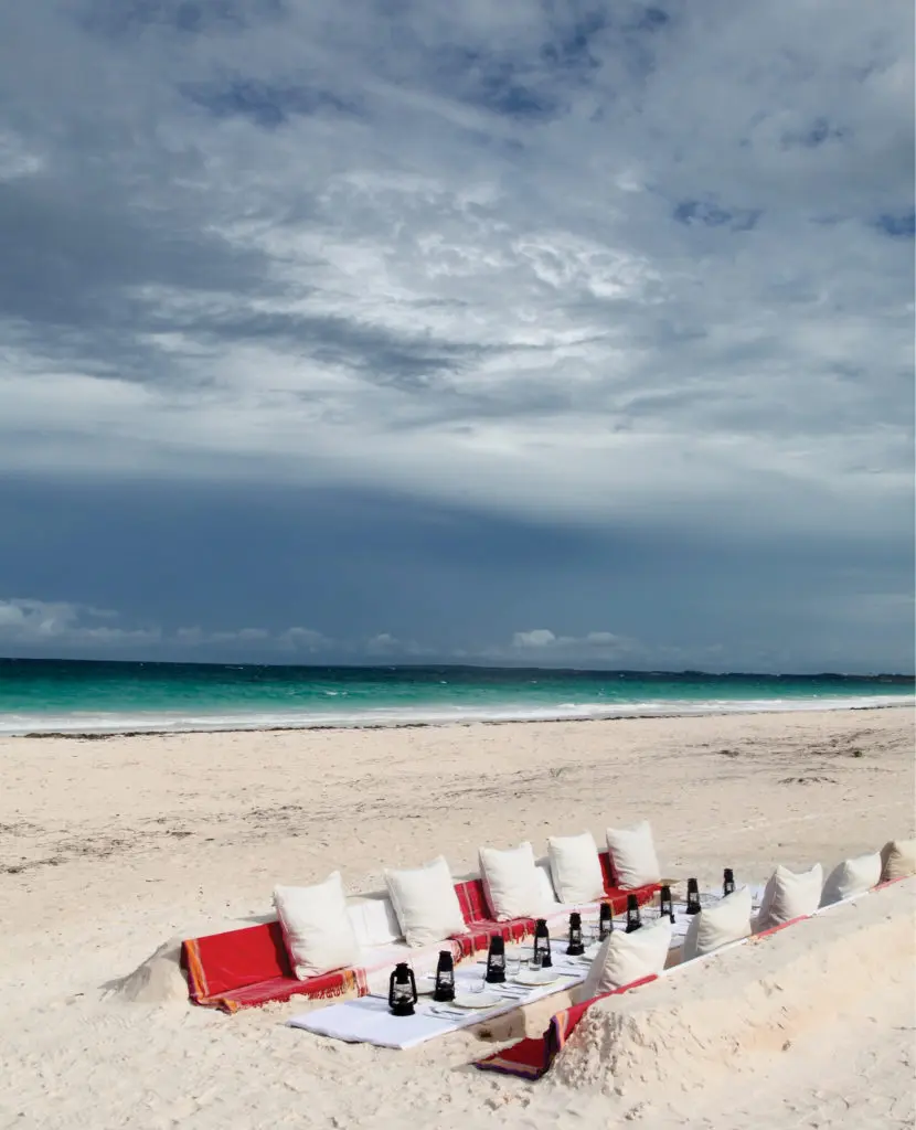 A beach setting for sunset dinner