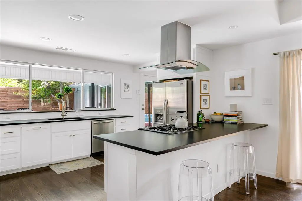 The updated kithcen features high-end, stainless steel appliances. 