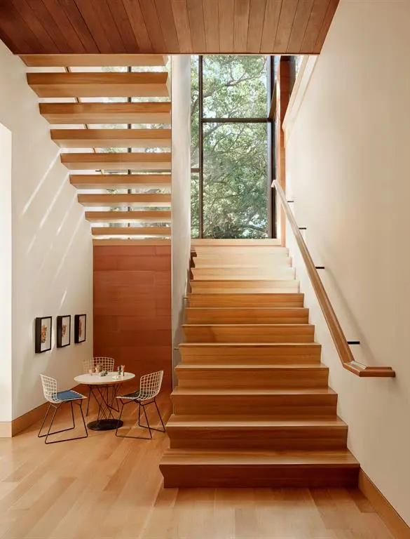 The Almondria wood stairs are grand in scale. 