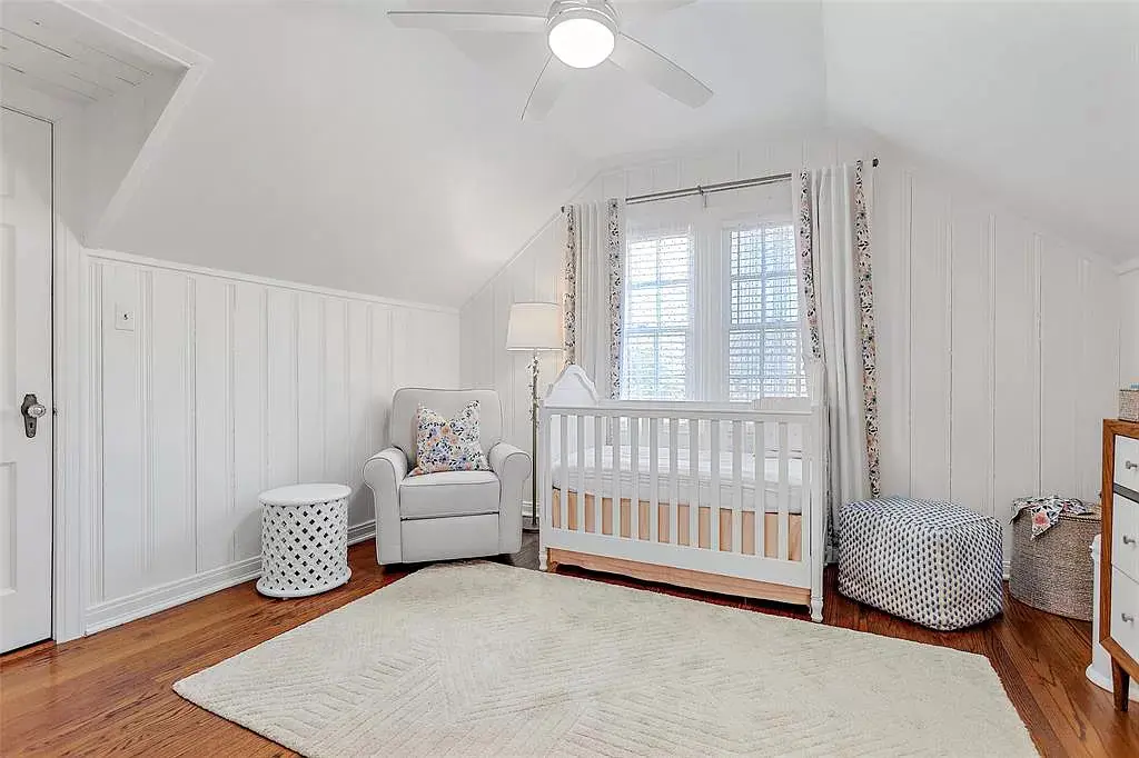 The third bedroom upstairs is fashioned as a nursery. 