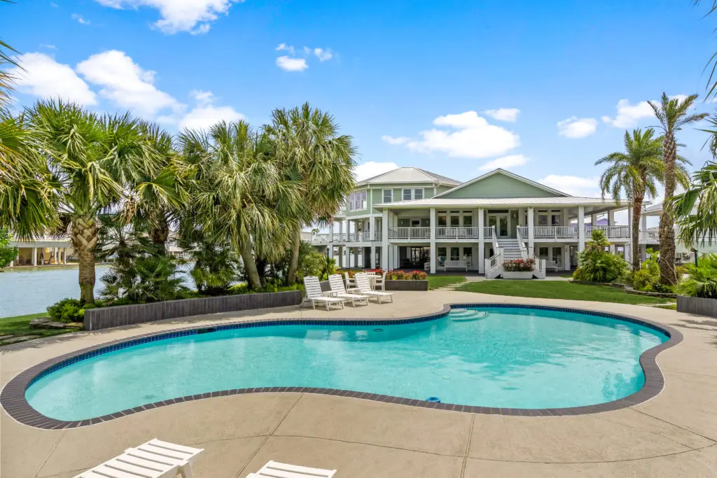 The swimming pool at 16502 Bayfront Drive in Jamaica Beach, listed with Douglas Elliman Realty (Photo by Sonya Bertolino for Douglas Elliman Realty)