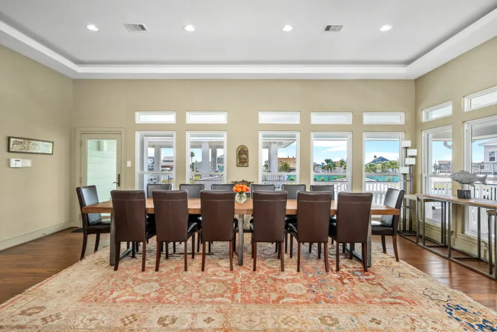 The spacious dining room of 16502 Bayfront Drive in Jamaica Beach (Photo by Sonya Bertolino for Douglas Elliman Realty))