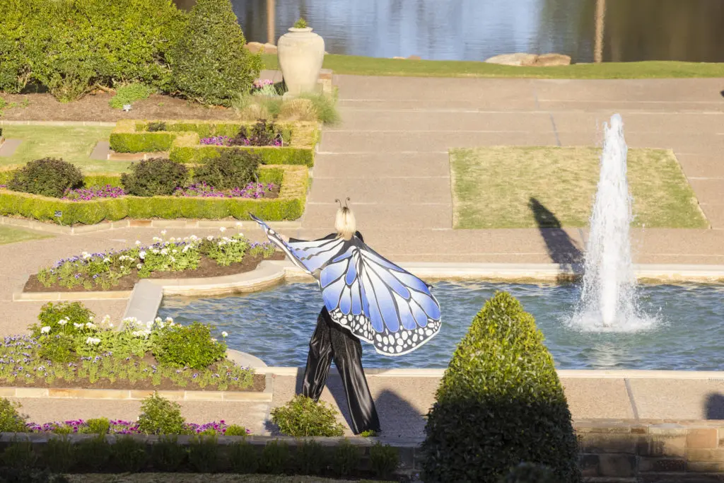 A butterfly on stilts at An Evening in the Garden. (Photo by Ellman Photography)
