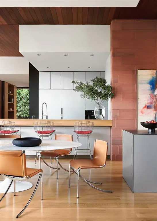 A dining nook just off the modern kitchen. 