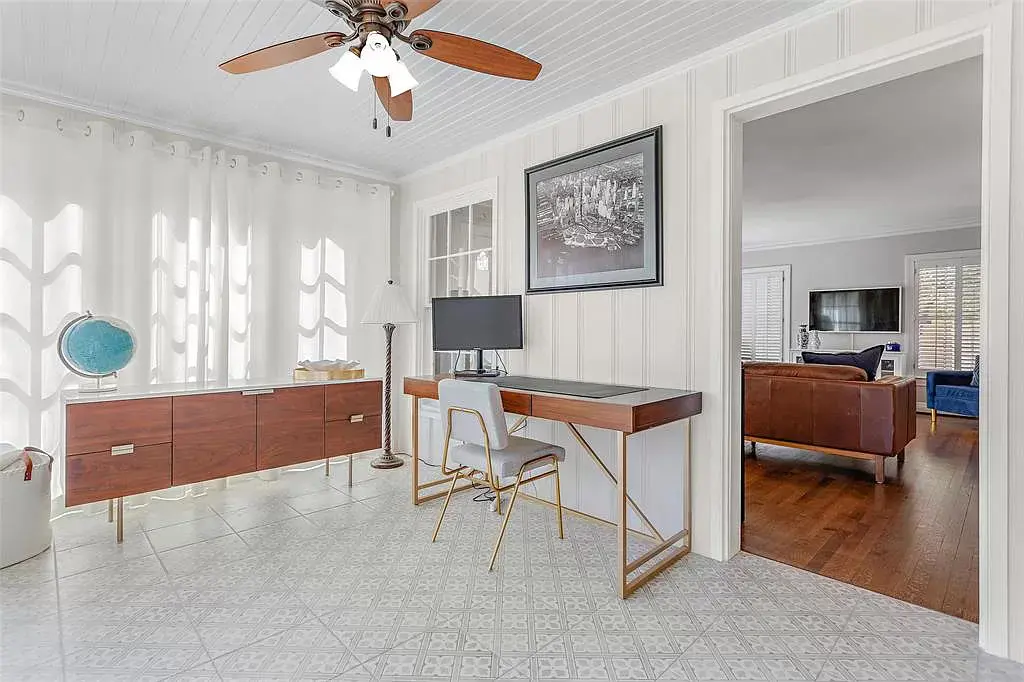 An airy sunroom in the Hollywood Heights Tudor. 